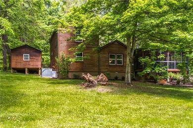 Front view showing extra storage building