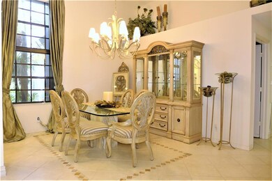 Large formal dining room with ample natural light