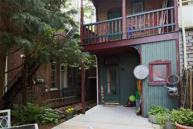 Door from kitchen leads to a backyard oasis!