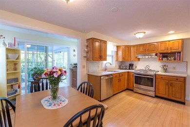 Fresh, sunny kitchen with direct...