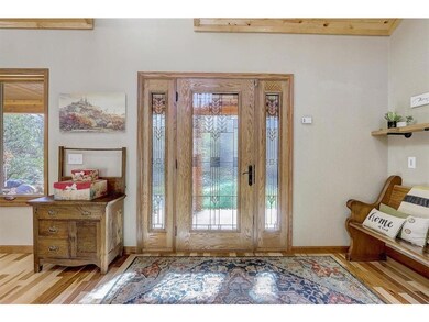 Welcome to this spectular home on 6+ wooded acres!