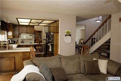 Family room open to kitchen and living room