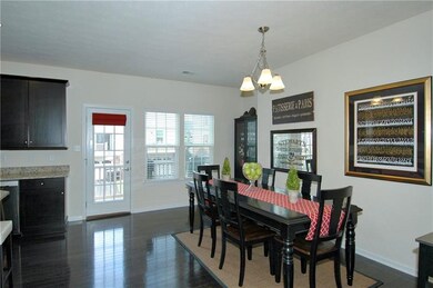 The kitchen and dining room feature the open conce