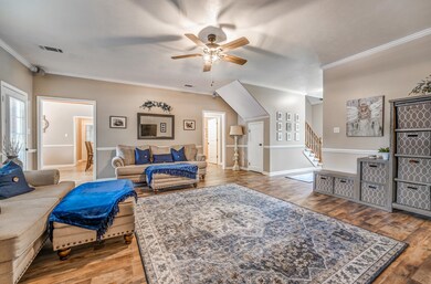 Living room with hardwood / wood-style flooring, c