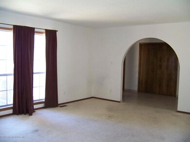 Living room to hall front entry