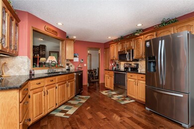 Spacious kitchen with custom crafted oak cabinets,
