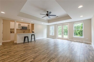 Light and bright 2nd family room with kitchenette opens to backyard