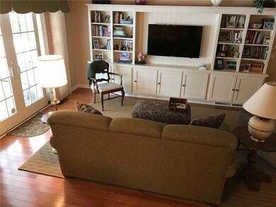 Hardwood flooring, beautiful custom built wall of