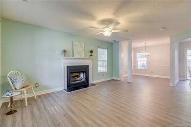 Large family room with gas fireplace and ceiling f
