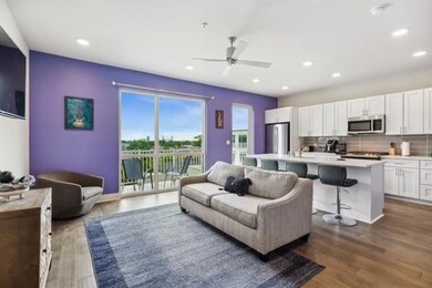 Open floor plan with great sliding doors to balcony!