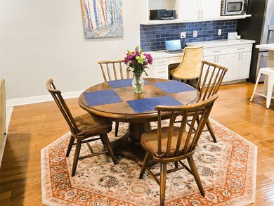 Open breakfast area can see the TV and the kitchen
