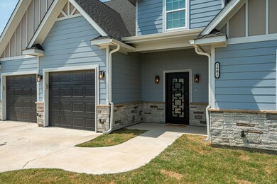 Great covered front porch that keeps your guests protected from the elements.