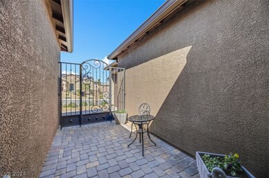Pavers & Custom Iron Gate with key pad.