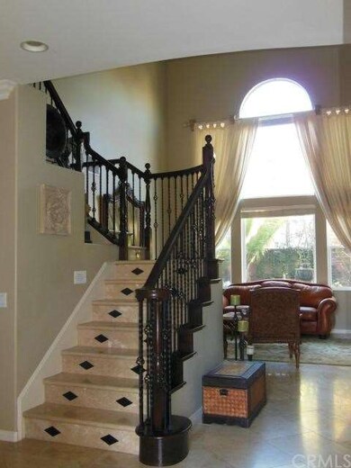 Beautiful Travertine Staircase with Rod Iron