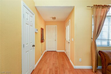 Hallway to bedroom and front door