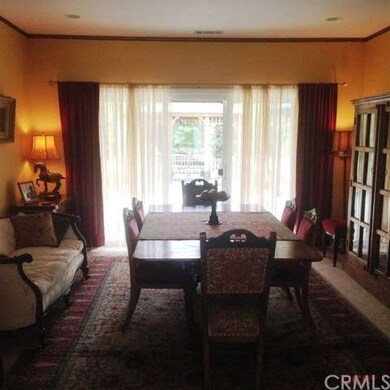 This formal living room that looks out onto the pa