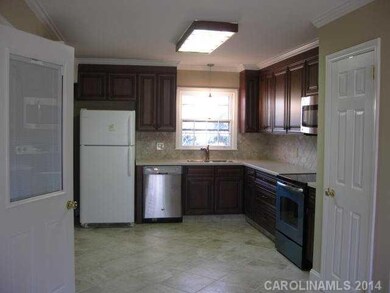 Kitchen - Kitchen has door opening to side porch