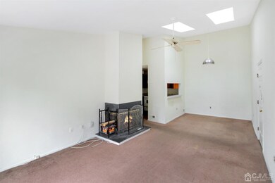 Living Room view towards Dining Room; with Kitchen