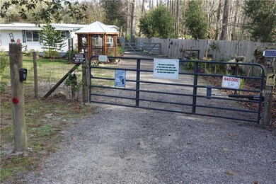 Electric security gate. Opens with pin pad and/or 