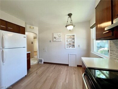 Kitchen with refrigerator and stove