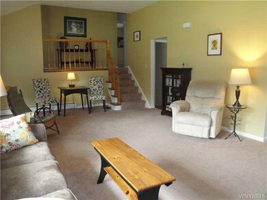 Living Room. Neutral Wall to Wall Carpeting Goes w