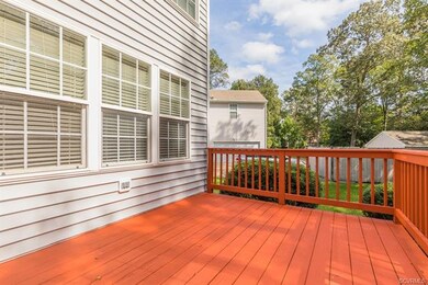 NEWLY PAINTED 10X12 DECK OVERLOOKS LANDSCAPED YARD