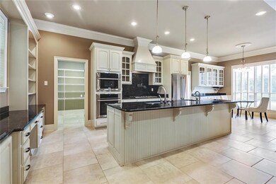 Another view of the kitchen, tons of beautiful cab