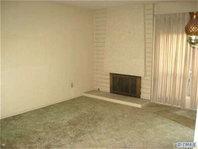 Spacious Living Room with Fireplace