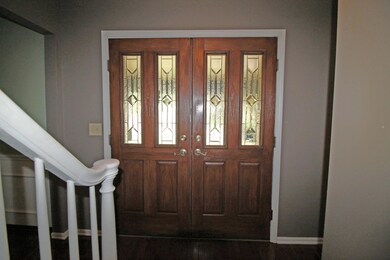 Double doors with leaded glass