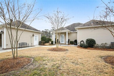 Back porch, back yard and side entrance to garage