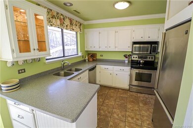 GOOD STORAGE & PREP SPACE, GLASS FRONT CABINET