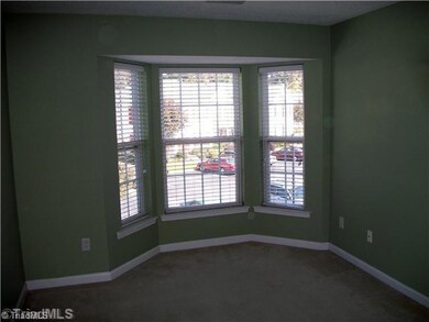 2nd Bedroom. What a focal point!  Bay windows allow lots of sun and are a nice accent to the room.