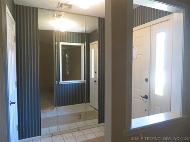 Inside Entry with mirror and look through opening