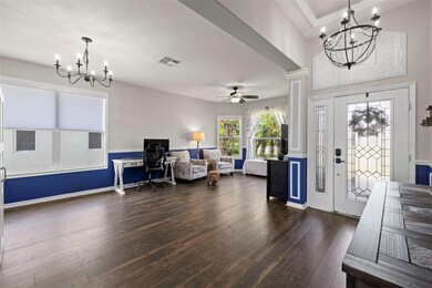 Front formal living space with 11 ft trey ceilings with crown molding