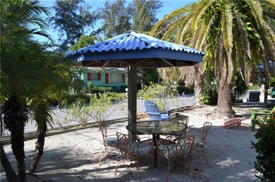 Sitting at your own table in the sand in your beac