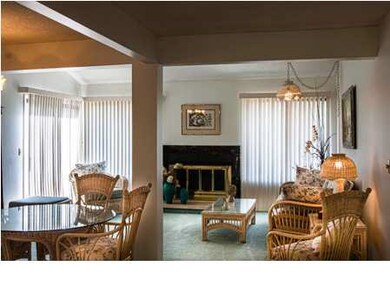 Inviting living room with fireplace.