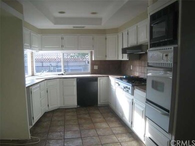 Added kitchen overlooks pool.