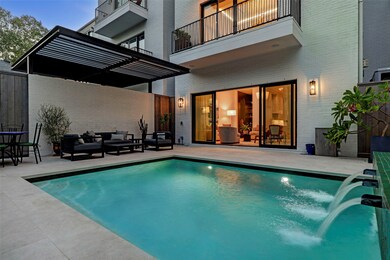 The outdoor space features a heated pool (16’x12’4