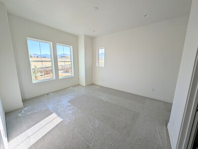Unfurnished room featuring carpet flooring, a mountain view, and recessed lighting
