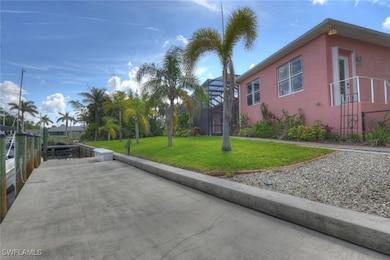 View of dock featuring a yard
