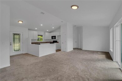 View of the Foyer and Kitchen from the Great Room