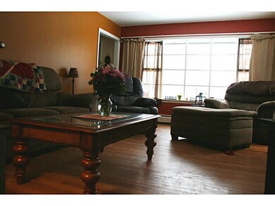 Living Room. Bright natural light enhances the liv