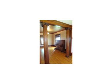 Other. Stately columns are a dramatic entry betwee