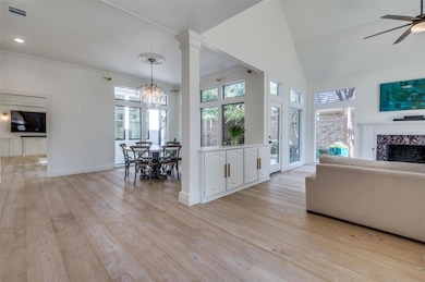Unfurnished living room featuring a premium firepl