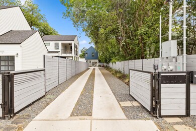 View of community featuring a gate