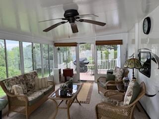 20' X 12'  Screened, Glassed and Air conditioned Family Room.