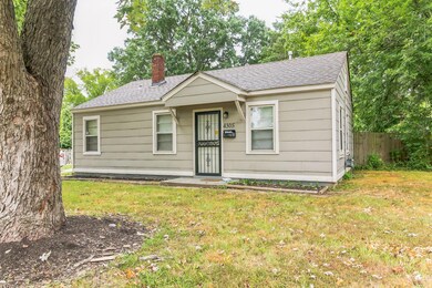View of front of property featuring a front yard