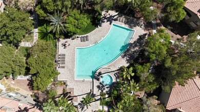 Aerial overview of property's location with a pool