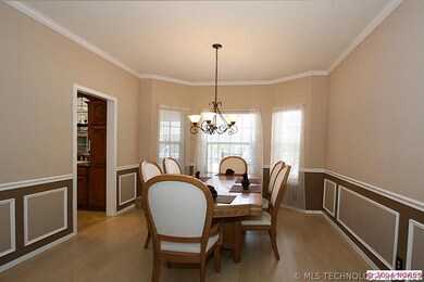 Formal dining features beautiful bay windows - hom