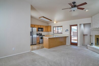 Family Rm w/Fireplace off Kitchen